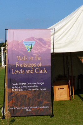 Educational display with tent and banner