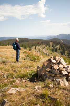 Trail worker viewing the mountains
