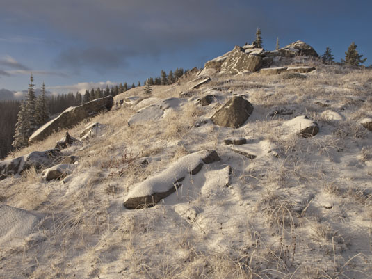 Snow on the rocky hill